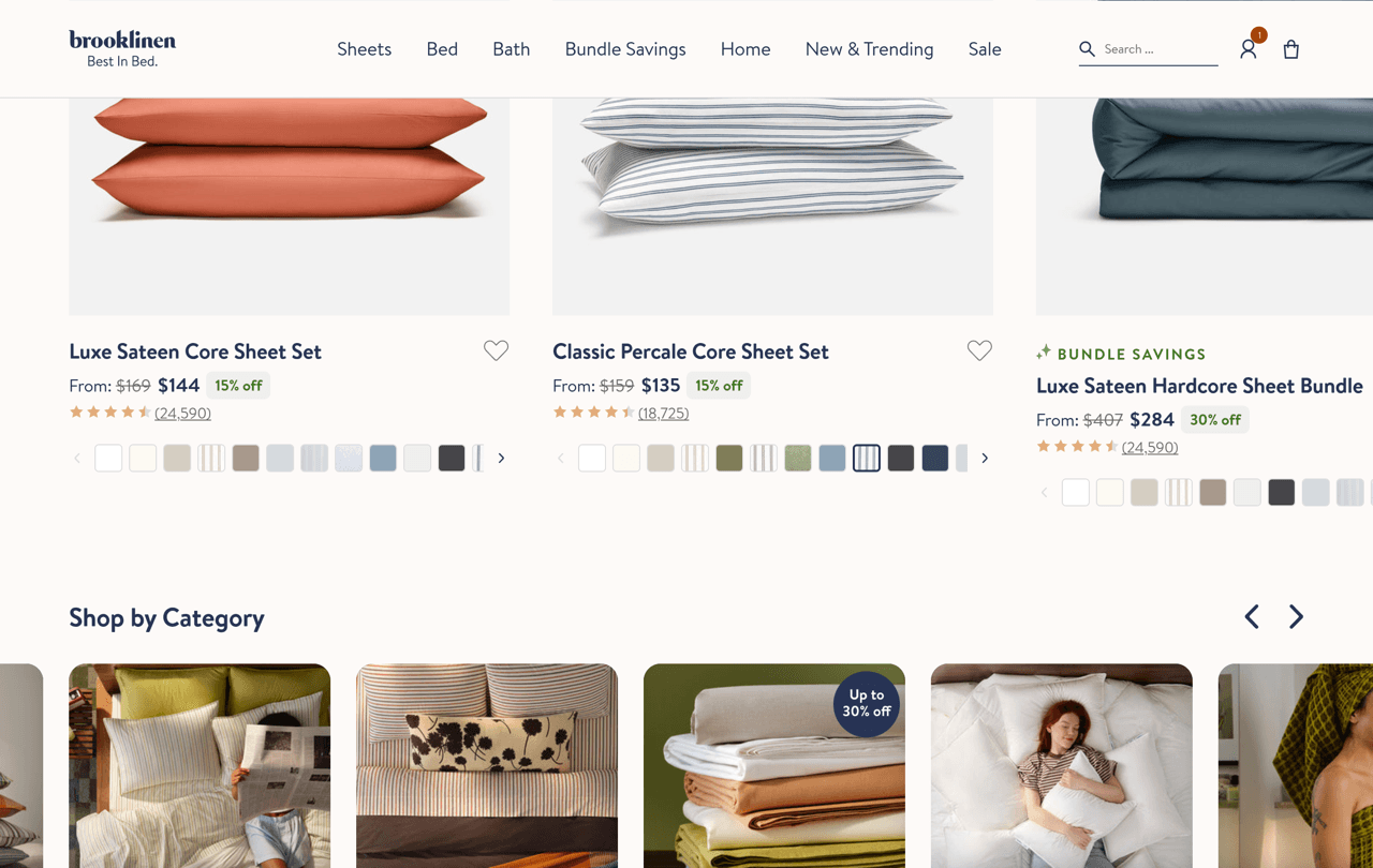 Brooklinen homepage product cards showing star ratings and review counts, 24,590 reviews for the Luxe Sateen Core Sheet Set and 18,725 for the Classic Percale Core Sheet Set