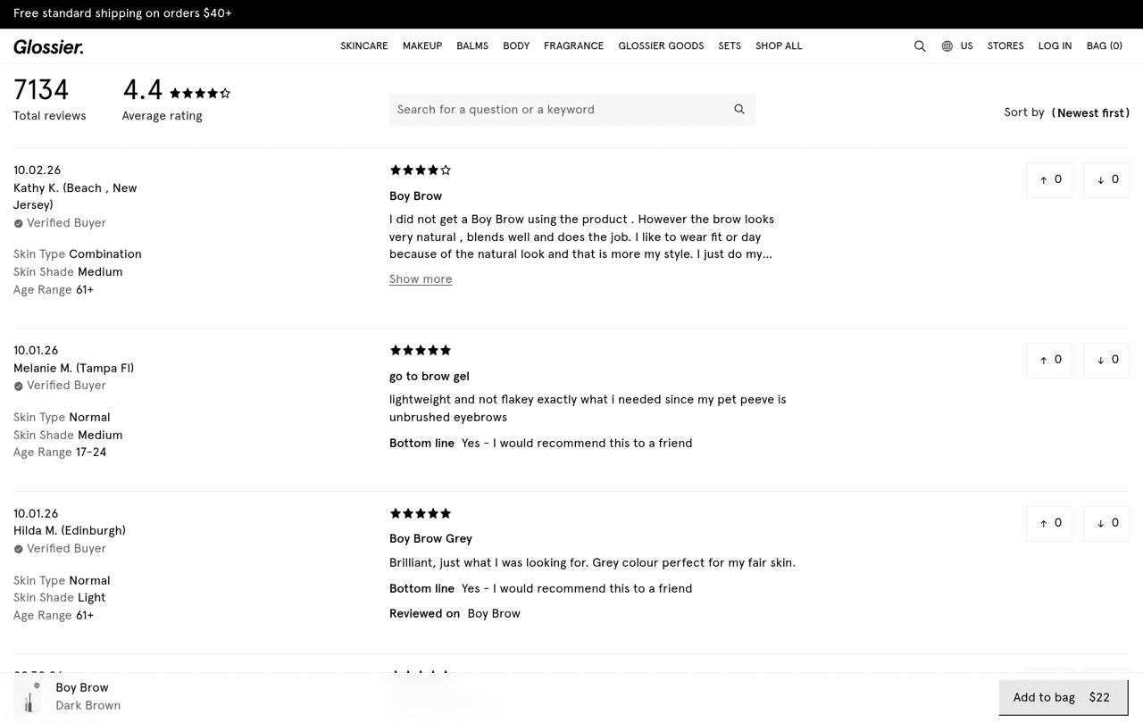 Glossier Boy Brow product page showing 7,134 reviews, a 4.4 average rating, and reviews tagged Verified Buyer with the reviewer's skin type, skin shade and age range